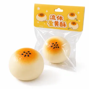 Jouet squishy réaliste en forme de pâtisserie au jaune d'œuf avec carte d'emballage