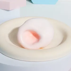 Gedetailleerde macro-opname van een zacht roze TPR squishy met mochi textuur