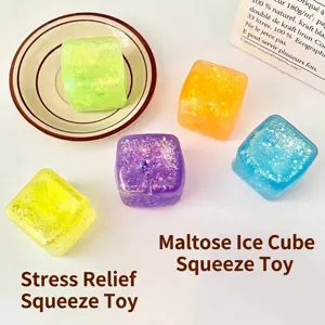 Close-up of colorful translucent glitter ice cube squeeze toys for stress relief