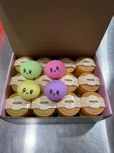 Soft colorful baozi squishy toys for stress relief packed in a bulk display box