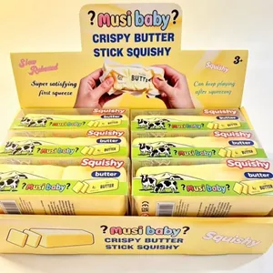 Vista detallada de los juguetes squishy Musi baby Crispy Butter Stick en su caja