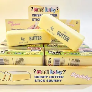 Juguete squishy realista con forma de barra de mantequilla para el estrés en caja expositora