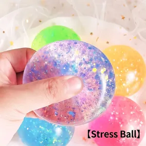 Balle anti-stress colorée à paillettes pour le soulagement du stress et le jeu