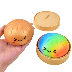 Soft cartoon steamed bun squishy stress relief toy with rainbow color and steamer basket