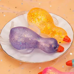 Lindos juguetes para apretar de pato con purpurina y textura de maltosa de rebote lento para niños