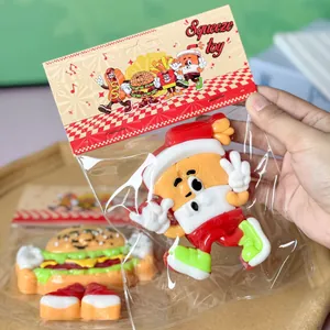 Detailed shot of soft silicone squeeze toy in retail packaging with fast food theme
