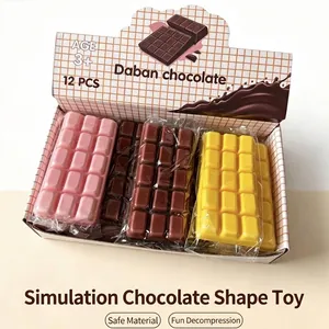 Close-up of three-color slow-rebound chocolate squishy toys in their display box.