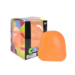 Vibrant orange candy-shaped maltose squeeze toy for stress relief with colorful box