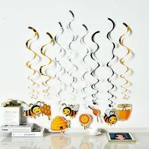 Hanging bee theme party swirls with honeycomb and flower cutouts for kids room decoration