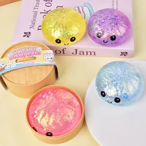 Jouets anti-stress de boulettes pailletées en plusieurs couleurs avec un mini cuiseur.