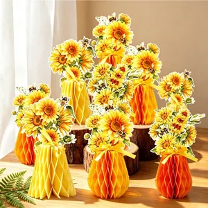 Set of 7 yellow and orange sunflower honeycomb centerpieces on wooden blocks