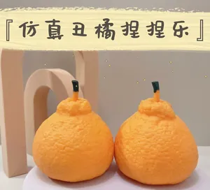 Pair of realistic orange-shaped slow rebound TPR squeeze toys for stress relief