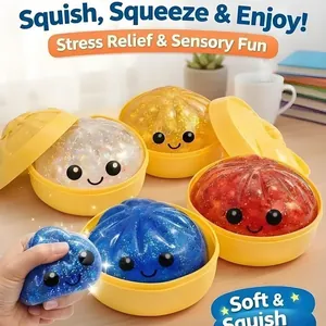 Giocattolo antistress glitterato a forma di raviolo in contenitori gialli per vapore