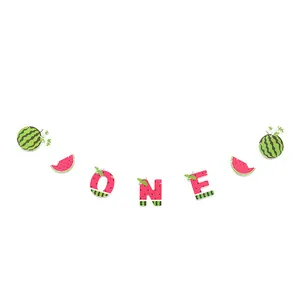Watermelon themed first birthday banner featuring letters ONE and fruit slices.