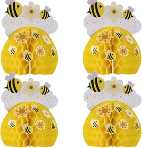 Detailed view of four cute yellow bee and sunflower honeycomb paper hanging decorations