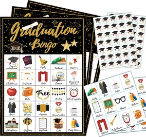 High-resolution detail of graduation bingo game cards featuring black and gold theme icons