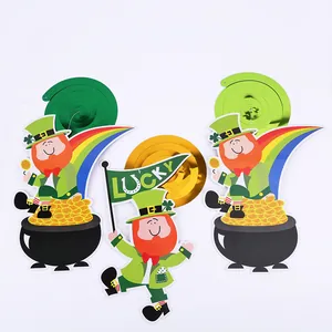 Detailed view of St. Patrick's Day leprechaun hanging decorations with metallic green spirals