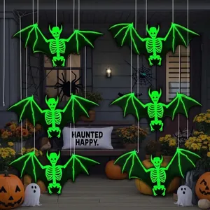 Neon green glow-in-the-dark bat skeleton hanging decorations for Halloween