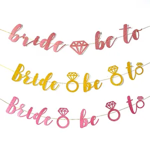 Glittery Bride to Be banners in rose gold yellow and pink for bridal shower party