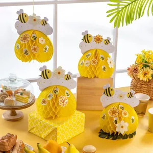 Vibrant yellow honey bee honeycomb paper ball decorations set for birthday parties