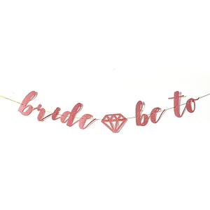 Glittery rose gold Bride to Be banner with diamond icon for bridal shower decorations