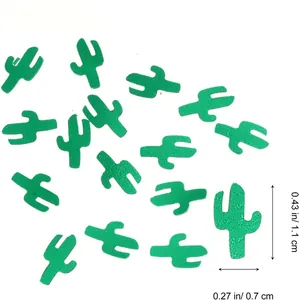 Close-up of green cactus PVC party confetti showing exact dimensions 1.1cm by 0.7cm