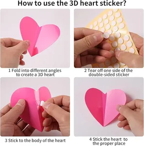 Guida illustrata su come piegare e applicare adesivi murali a cuore 3D per feste.
