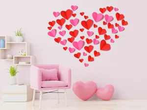 Adesivi murali 3D a cuore rossi e rosa disposti a forma di cuore per decoro romantico.