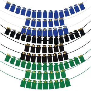 Details of graduation party photo frame banners in blue, black, and green colors