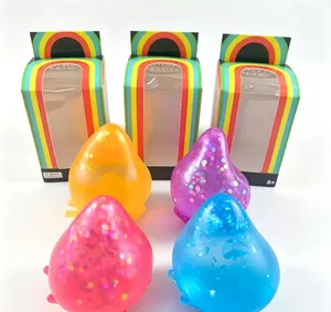 Jouets squishy en forme de goutte d'eau colorés avec paillettes et boîtes cadeau arc-en-ciel