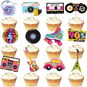 Collection of twelve retro 80s and 90s themed cupcake toppers displayed on white frosted cakes.