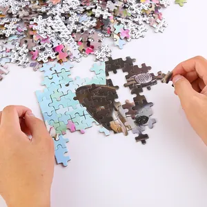 Vue détaillée d'un puzzle de 500 pièces représentant un chiot assemblé à la main