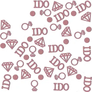 Close-up of pink glittery wedding confetti in diamond, ring, and I DO letter shapes