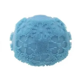 Close-up detail shot of light blue textured stress relief squeeze toy with floral pattern