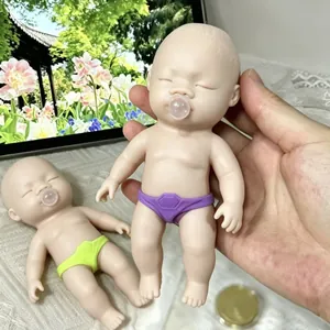 Detailed view of a soft silicone baby doll squeeze toy for slow rebound stress relief.