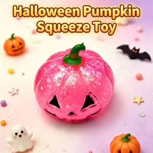 Cute pink glittery pumpkin squishy toy for Halloween stress relief and festive decoration