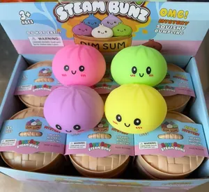 Close-up of colorful squishy steam bun dumplings in a display box for stress relief