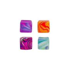 Set of four colorful marbled stress relief squeeze cubes with slow rebound effect