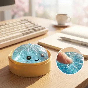 Glitter blue dumpling squishy toy in yellow steamer container for stress relief