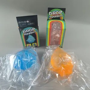 Juguetes squishy gota de agua con purpurina y empaque de arcoíris para el estrés