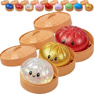 Set de jouets anti-stress baozi colorés dans des paniers vapeur en plastique créatifs