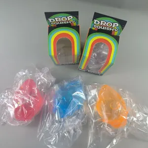Juguetes antiestrés squishy gota de agua brillante con cajas de regalo arcoíris