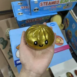 Jouet squishy en forme de brioche dorée pailletée pour soulager le stress