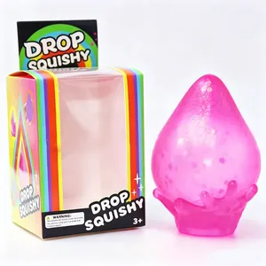 Juguete antiestrés squishy de gota rosa con purpurina y caja de embalaje arcoíris