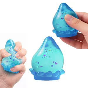 Jouet de décompression en forme de goutte bleue pailletée avec une finition aurore