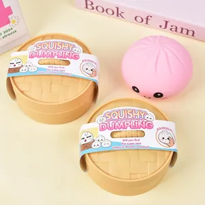 Close-up detail of cute pink squishy dumpling toy with realistic steamer box containers.
