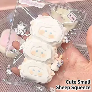 Close-up of cute triple-stacked cartoon sheep squishy toy in clear packaging
