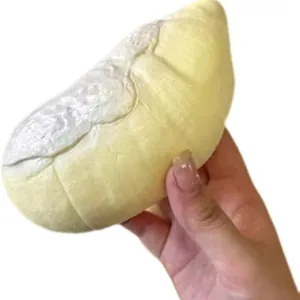 Yellow slow rising butter stick squishy toy held in hand for stress relief and fun