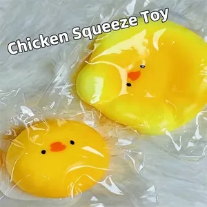Detail view of a cute yellow chick squishy toy in plastic packaging for stress relief