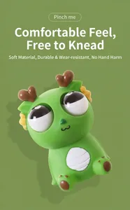 Cute green eye-popping dragon squeeze toy for stress relief and relaxing sensory play